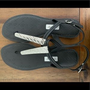 Strapped sandals with rhinestone details.